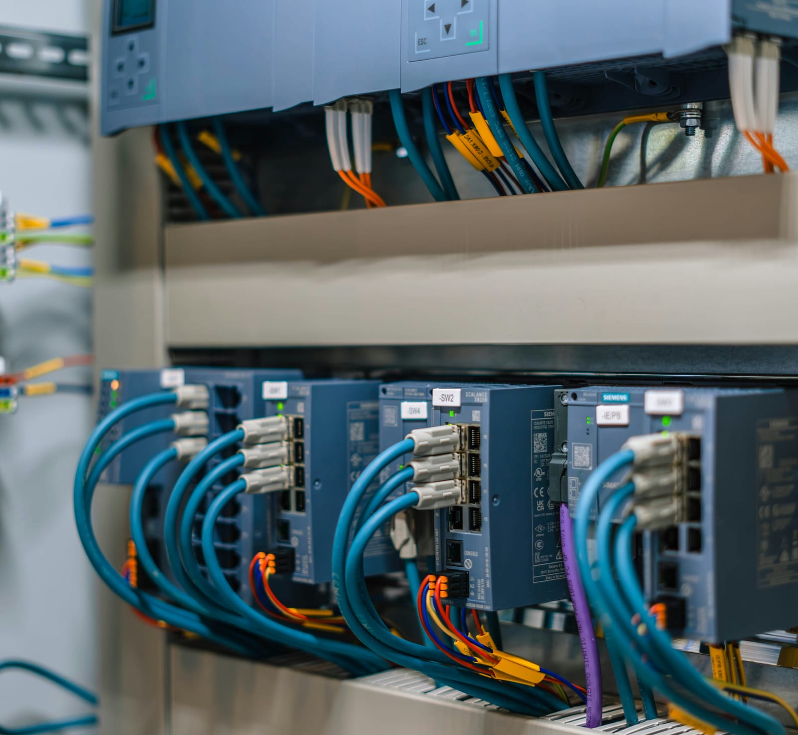 PLC controllers and switching modules in a control cabinet